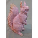 A contemporary pink fibreglass model of a squirrel, H.28cm