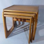 A G-plan teak nest of three tables