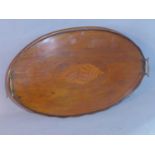 An Edwardian mahogany and boxwood inlaid twin handled tray, with shell paterae to centre, L.59 W.