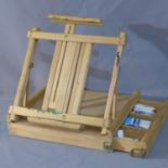 An artists easel box, with contents
