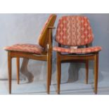 A pair of mid 20th century stylish Danish teak dining chairs