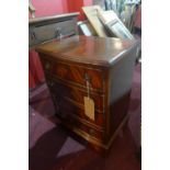 A Georgian style mahogany bow front side chest, with four drawers, raised on bracket feet, H.60 W.45