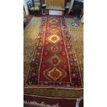 An Afghan red ground rug