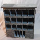 A distressed pigeon hole cabinet, with six drawers, H.85 W.78 D.26cm