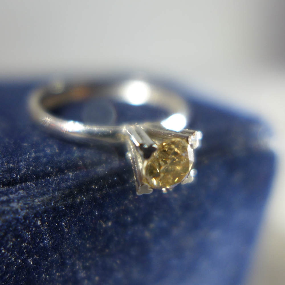 A white metal solitaire diamond ring, the round cut diamond approx. .45cts, tests as gold - Image 3 of 4