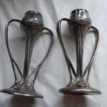 Attributed to Archibald Knox (1864-1933) for Liberty & Co., a pair of Tudric twin handled pewter