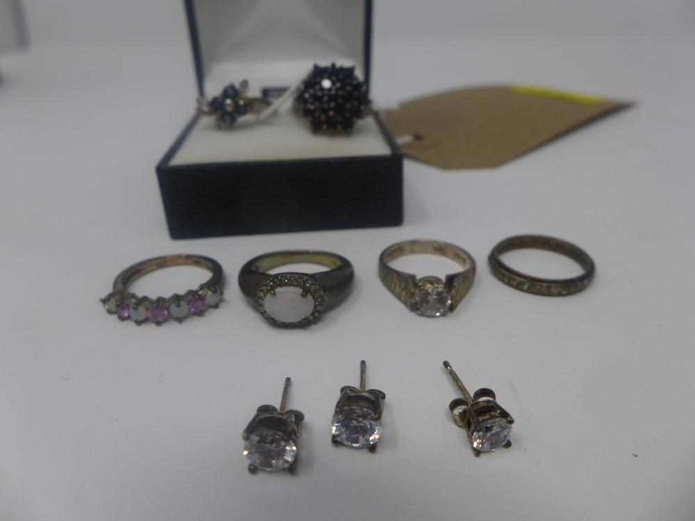 A collection of silver jewellery, various, to include a flower design dress ring, opal and rose - Image 2 of 2
