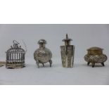 Four Chinese silver items to include three pepperettes and a bird cage, bearing marks to base