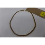 A yellow gold herringbone necklace, stamped 14k, gross weight 22g approx.