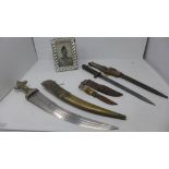 A white metal bound dagger, together with an early to mid 20th century bayonet and scabbard, and a