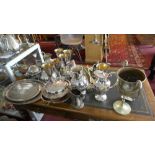 A collection of silver plated ware, to include six goblets, milk jugs, a trophy, trays, egg