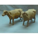 Two cast iron cows, H.22cm (2)