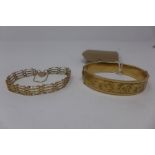 A vintage yellow 9ct gold bangle having engraved design and a 9ct gold four bar gate bracelet with