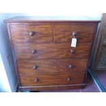 A Victorian mahogany chest with two short over three long drawers raised on stepped base, H.120 W.