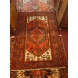 A fine North West Persian Zanjan rug, central diamond medallion on a terracotta field within