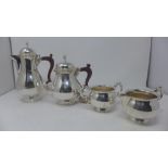 A four piece Garrard & Co. Ltd silver plated tea set, comprising a teapot and hot water pot with