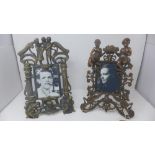 Two Victorian gilt metal picture frames with winged horses, figures and scrolling foliage with