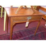 A Georgian oak and fruitwood side table with single drawer, shaped apron, on tapered legs, H.71 W.88