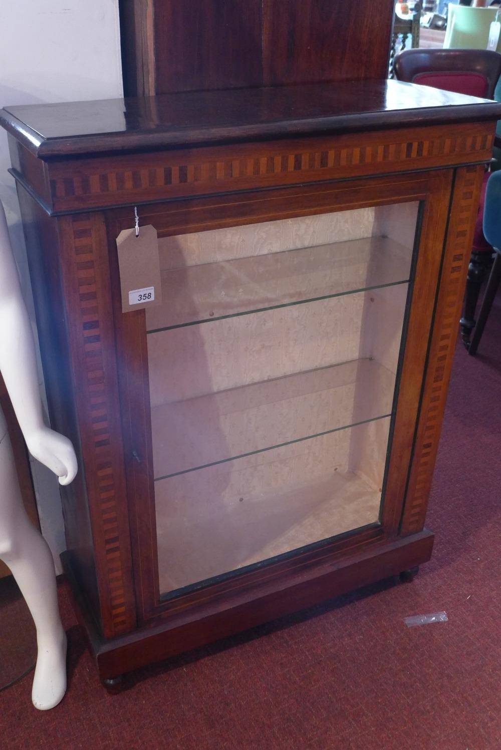 A late 19th century mahogany pier cabinet with marquetry inlay, raised on stepped base, H.104 W.76