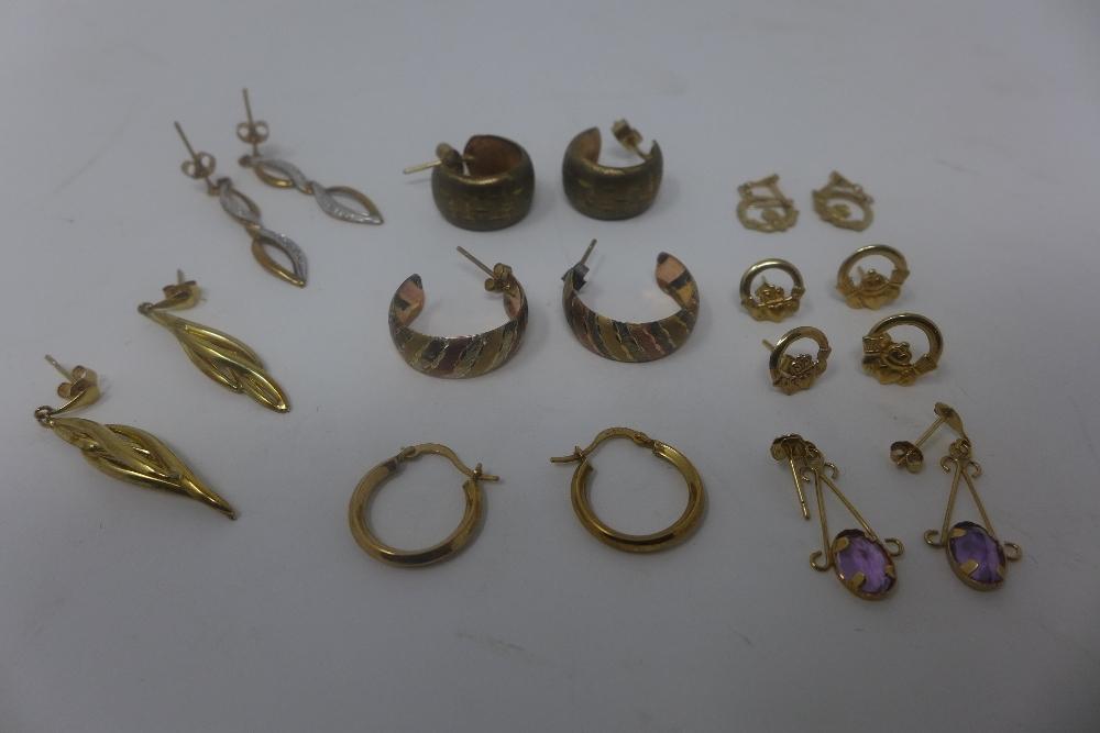 A collection of yellow 9ct gold vintage earrings, gross weight 8g