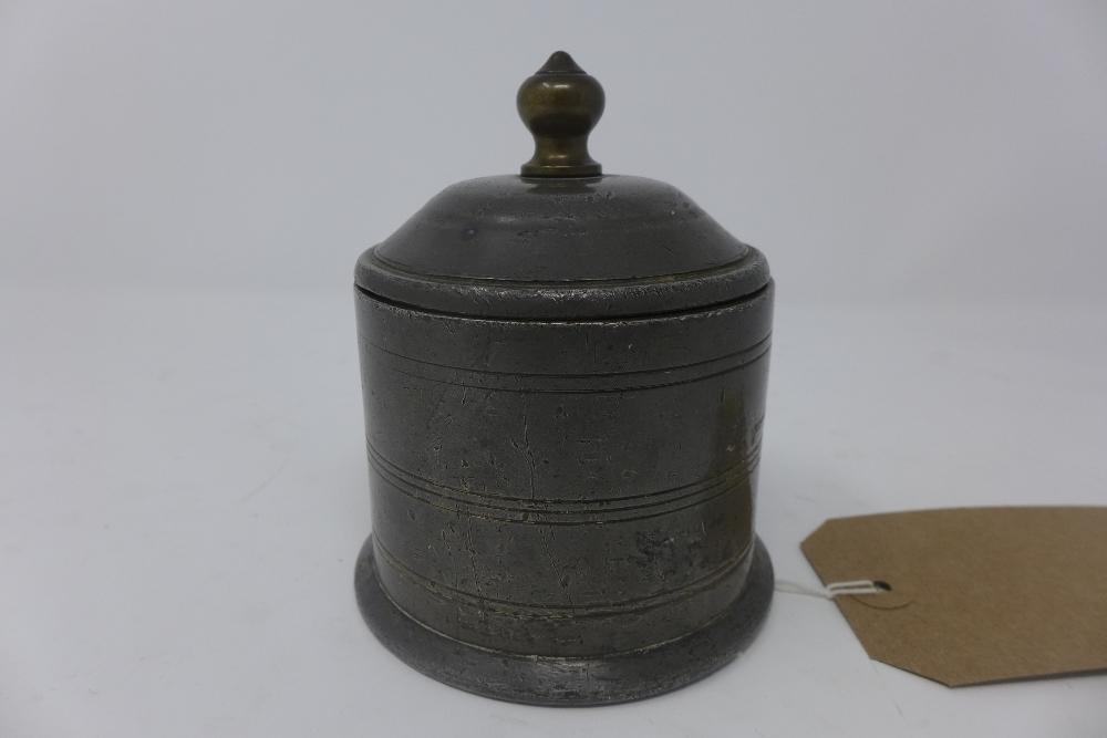 An early 18th century Chinese metal tobacco jar, with internal lead weight, H.12cm