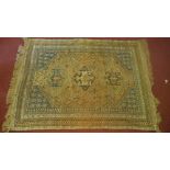 An antique Qashqai carpet, with triple geometric medallion, surrounded by geometric motifs and
