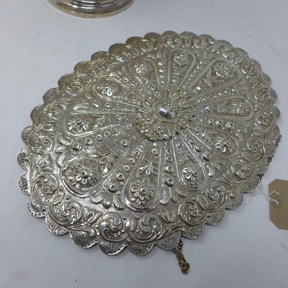 A white metal mounted mirror, possibly silver, together with a silver baby rattle and a silver - Image 8 of 8