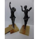 A pair of Art Deco painted chrome figures of dancers, raised on alabaster base, H.24cm