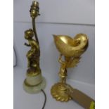 A gilded bronze nautilus, together with a French gilt metal lamp, signed