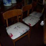 A set of four 1950's kitchen chairs and matching stool with nautical design vinyl stuff over