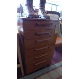 A 20th century Schleiber teak pedestal chest of six drawers, raised on castors, H.85 W.50 D.43cm