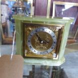 A Mappin & Webb green onyx mantel clock, Roman and Arabic gilt dial with silvered chapter ring,