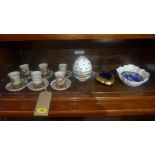 A set of six Limoges porcelain cups and saucers, having gilt metal holders, together with a