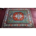 A Kazak carpet, geometric medallion on a turquoise ground, contained by geometric borders,