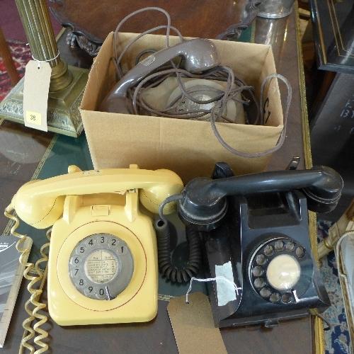 Three vintage dial telephones, (3)