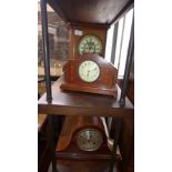 A mid 20th century mahogany mantel clock, silvered Arabic dial, chiming gong, H.23cm, together