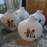Two pairs of Chinese crackle glazed moon flasks, bearing Chinese characters to body, H.35cm (4)