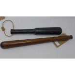 A Victorian wooden police truncheon, painted with crown and VR, H.44.5cm, together with a