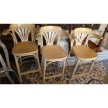 A set of three contemporary beech bar stools (3)