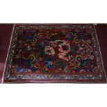 A Persian carpet with floral motifs on a red ground, contained by floral borders, 207 x 150cm