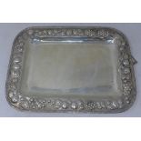 A Mexican silver tray with embossed fruit border, stamped 900, 26oz