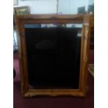 An early 20th century Continental carved pine frame, H.102cm W.84cm
