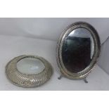 A Spanish silver mounted oval easel mirror with bevelled plate, together with a Mexican silver