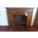 An 18th century and later mahogany hall cabinet, with frieze drawer over two inverted shelves, H.