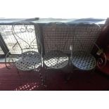 A set of three contemporary metal bistro chairs with strap work seats, (3)