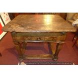 A late 19th century oak table, with walnut inlaid shapes of the moon, sun, stars and dated 1867,