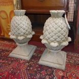 Two reconstituted stone pineapple finials, H.49cm