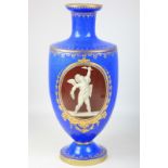 A late 19th century Coalport porcelain vase, decorated with vignettes of cherubs on a brown