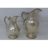 Two Mexican silver jugs, stamped 900, 34oz, bent at bases