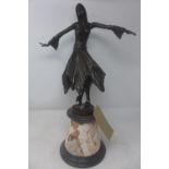 An Art Deco style bronze study of a dancer, raised on marble base, H.56cm